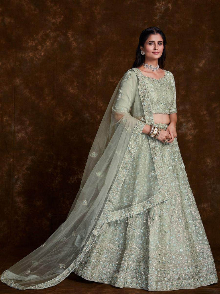 Stunning Pista-Green Embroidered Organza Wedding Lehenga Choli.