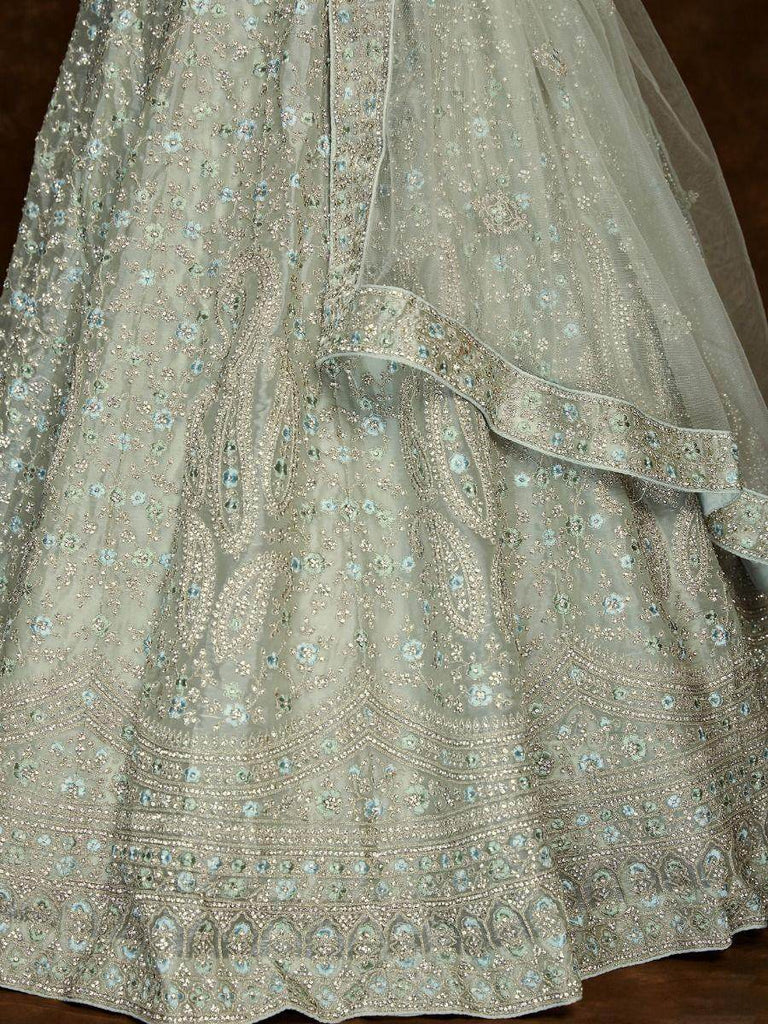 Stunning Pista-Green Embroidered Organza Wedding Lehenga Choli.