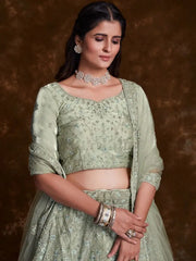 Stunning Pista-Green Embroidered Organza Wedding Lehenga Choli.
