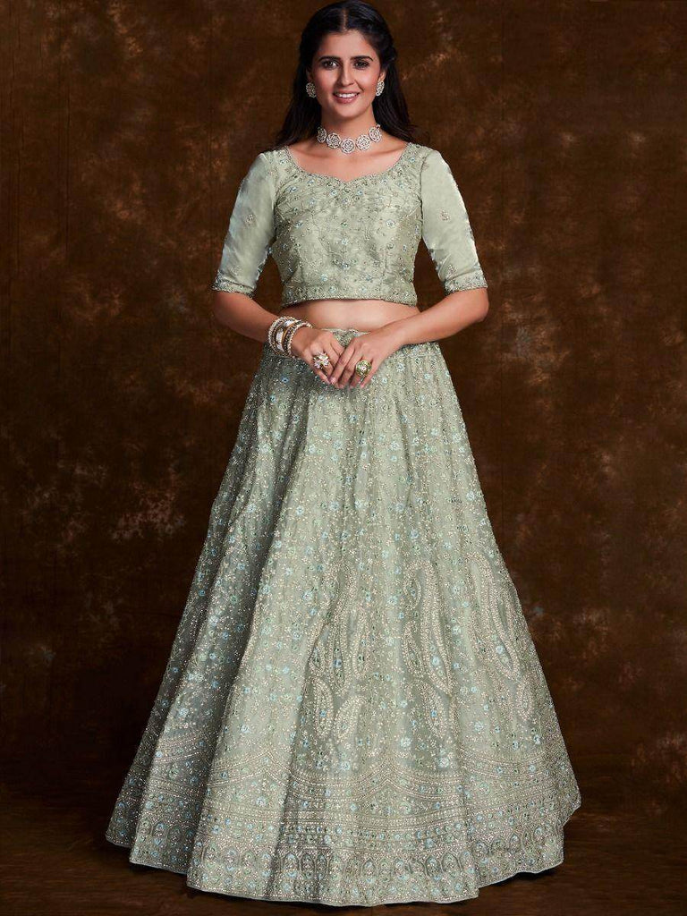 Stunning Pista-Green Embroidered Organza Wedding Lehenga Choli.