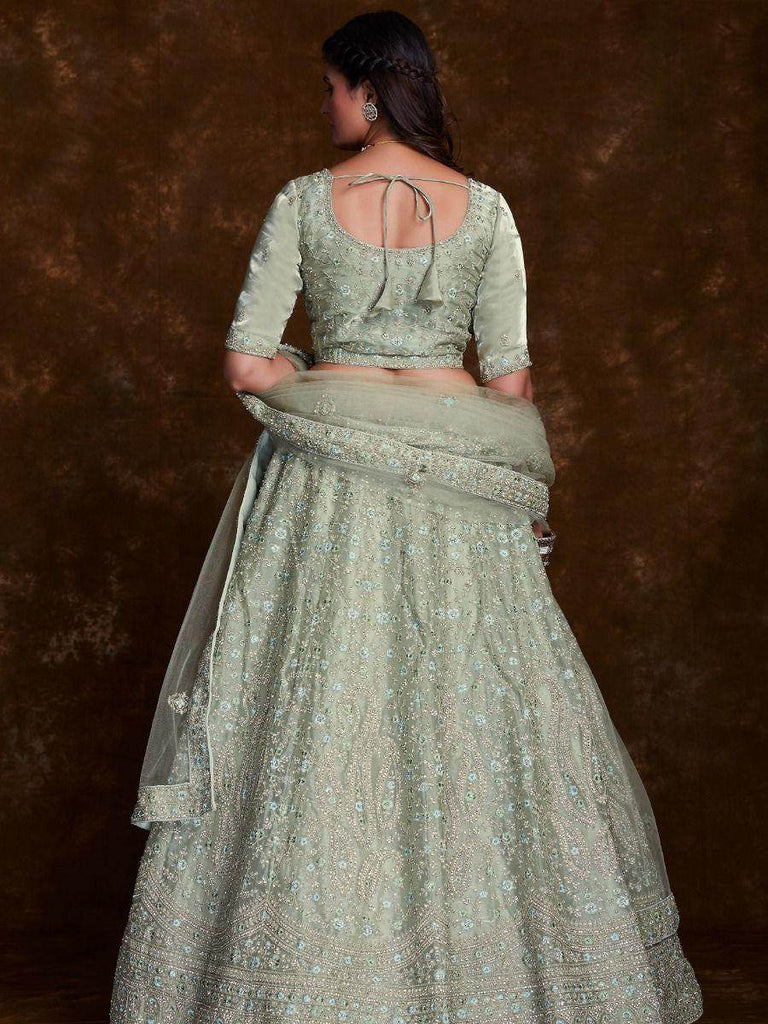 Stunning Pista-Green Embroidered Organza Wedding Lehenga Choli.