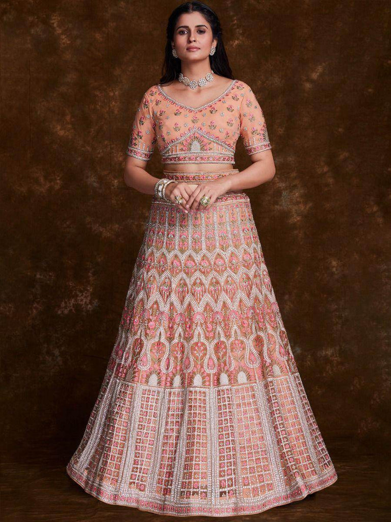 Blossoming Peach Embroidered Soft Net Wedding Lehenga Choli