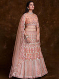 Blossoming Peach Embroidered Soft Net Wedding Lehenga Choli