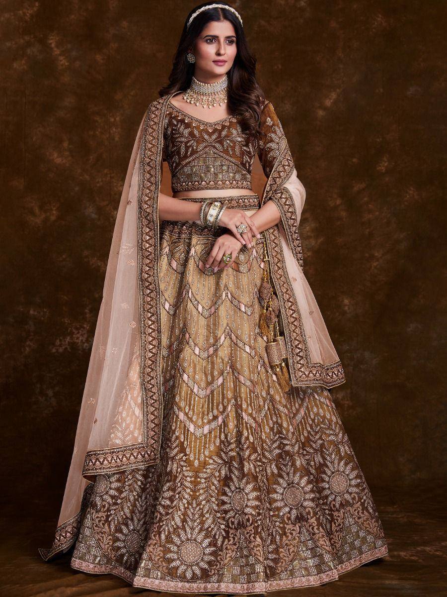Elegant brown embroidered lehenga choli with dupatta, perfect for Indian weddings and festive occasions