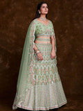 Captivate Pista Green Embroidered Soft Net Wedding Lehenga Choli
