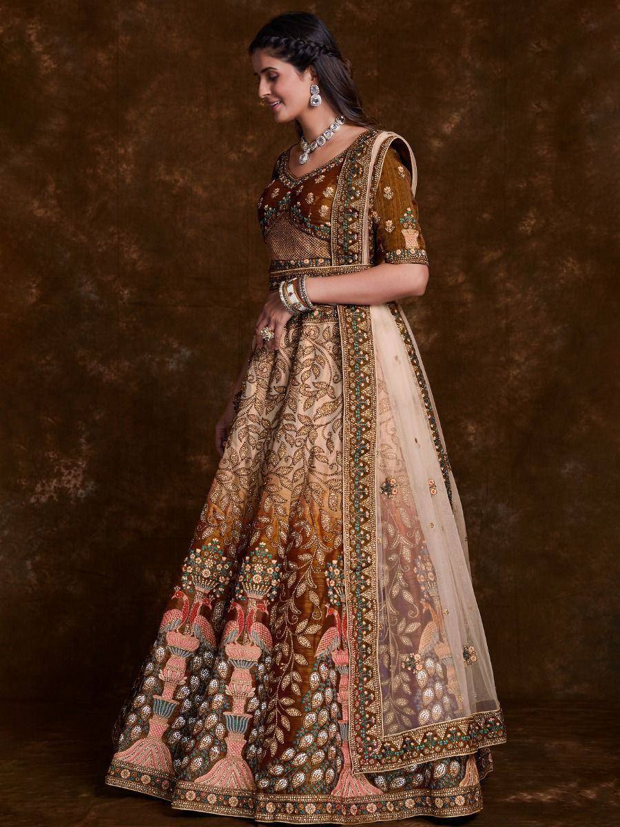 Elegant Indian lehenga choli with peacock embroidery, perfect for weddings and festive occasions.