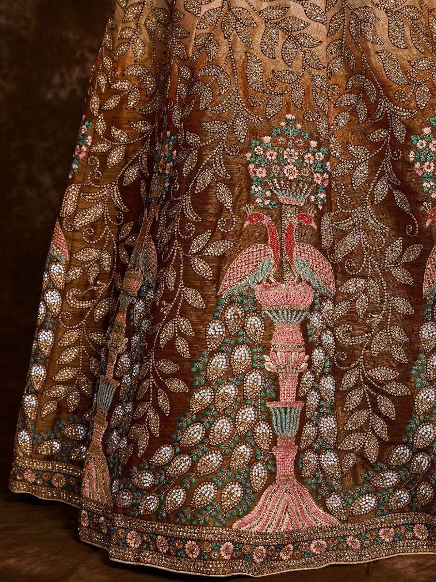 Brown embroidered lehenga with peacock and floral motifs, perfect for Indian ethnic wear