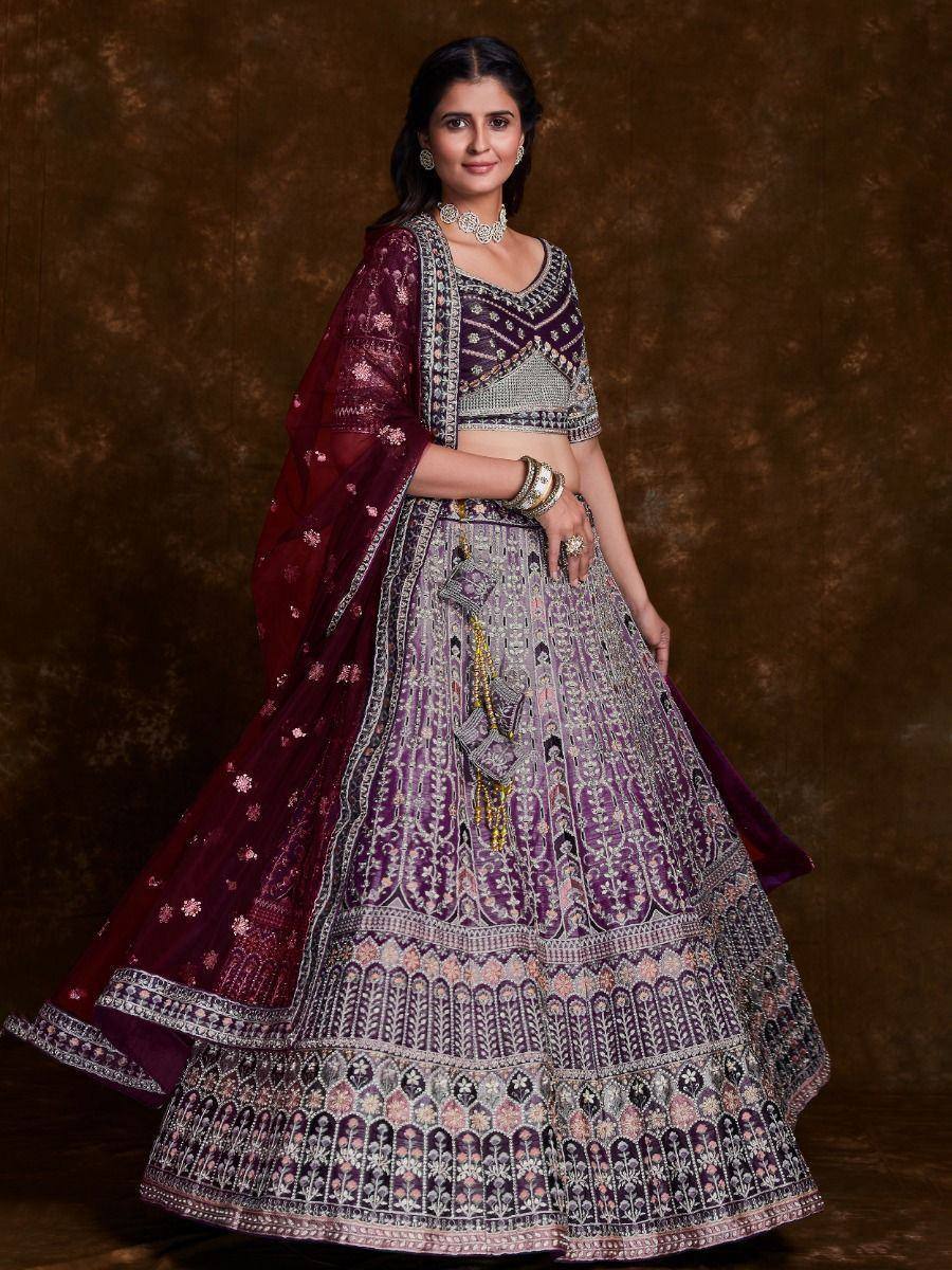Purple and maroon embroidered lehenga choli with dupatta, perfect for Indian weddings and festive occasions