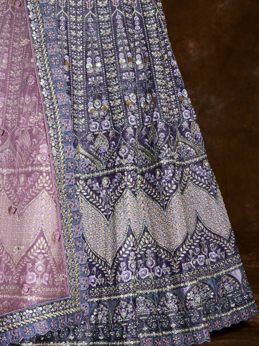 Purple embroidered lehenga choli with floral zari work and sheer dupatta, ethnic Indian wear