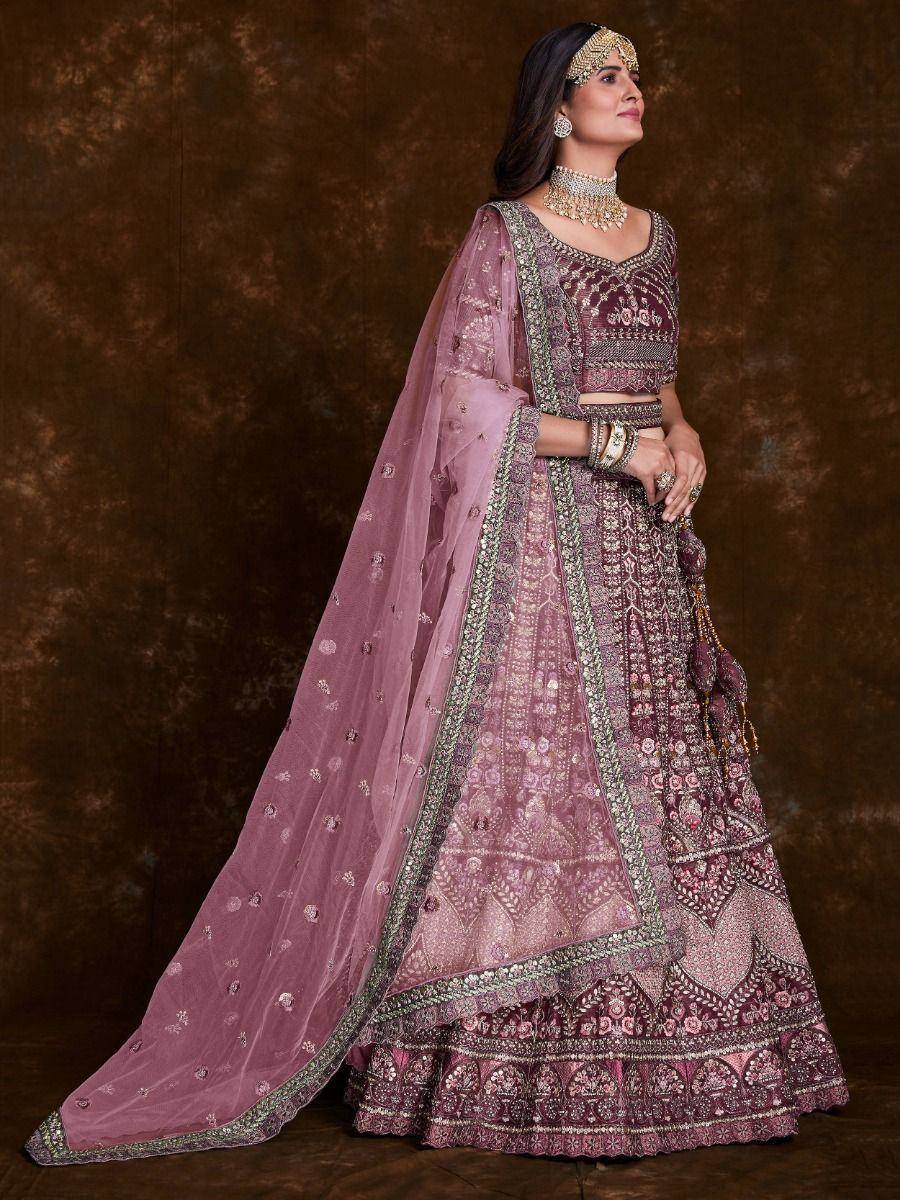 Elegant mauve lehenga choli with intricate embroidery and matching dupatta, perfect for Indian weddings and festive occasions.