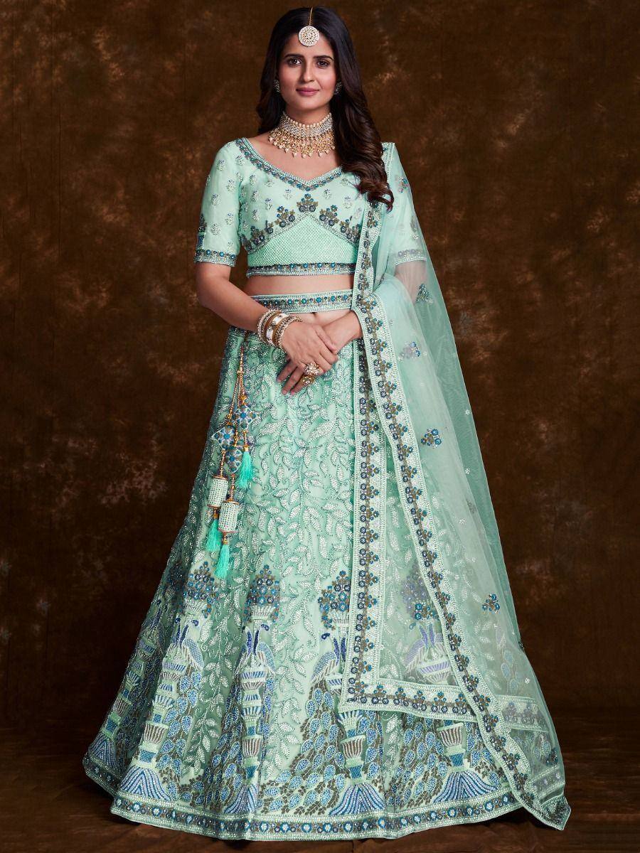 Mint green designer lehenga choli with peacock embroidery and matching dupatta for Indian ethnic wear