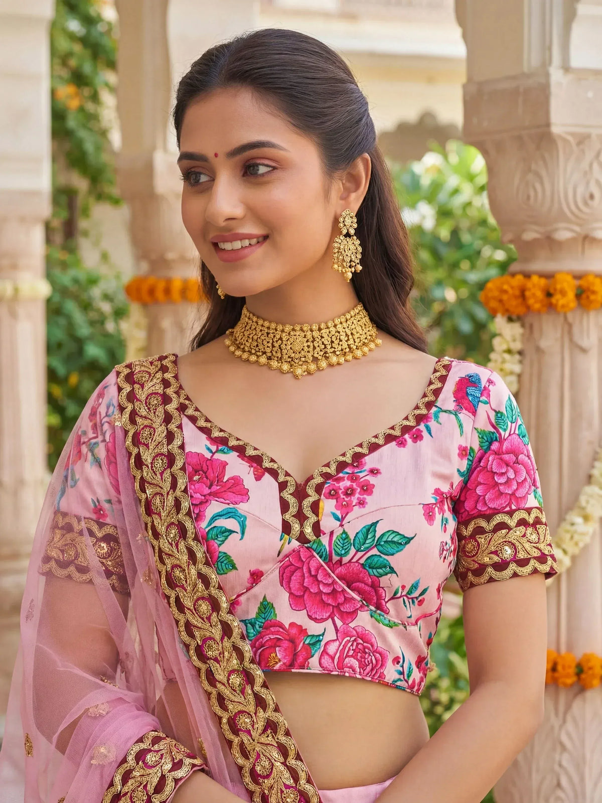 Pink floral lehenga choli with gold embroidery, perfect for Indian ethnic wear and festive occasions