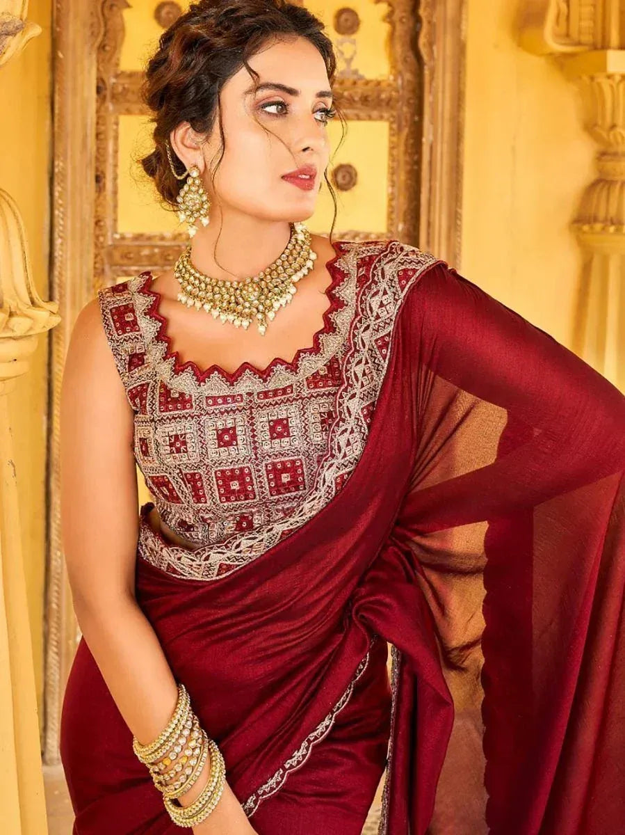 Maroon designer saree with embroidered blouse, perfect for Indian ethnic wear occasions