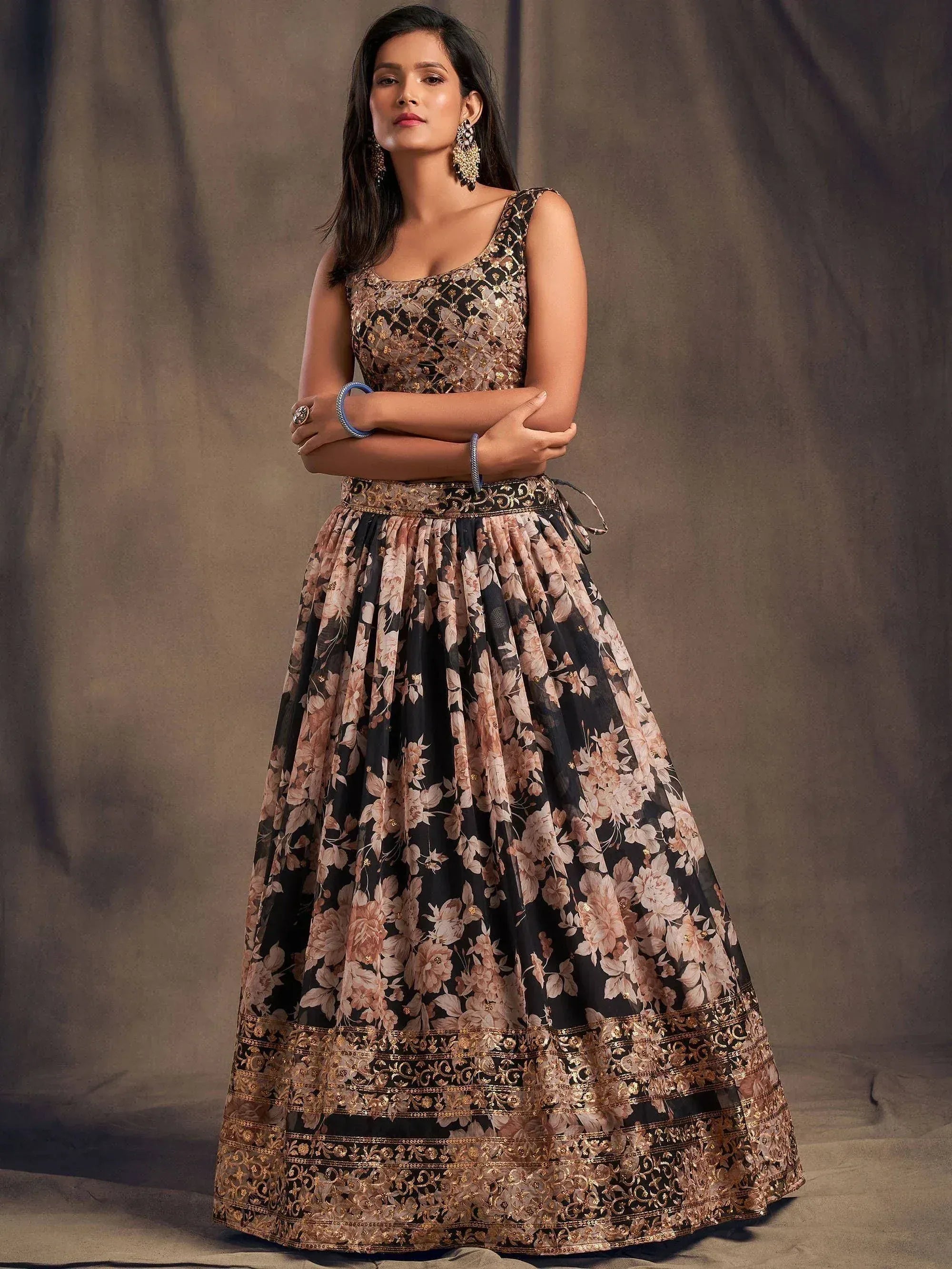 Black and gold floral lehenga choli with embroidered blouse and skirt, perfect for Indian ethnic occasions