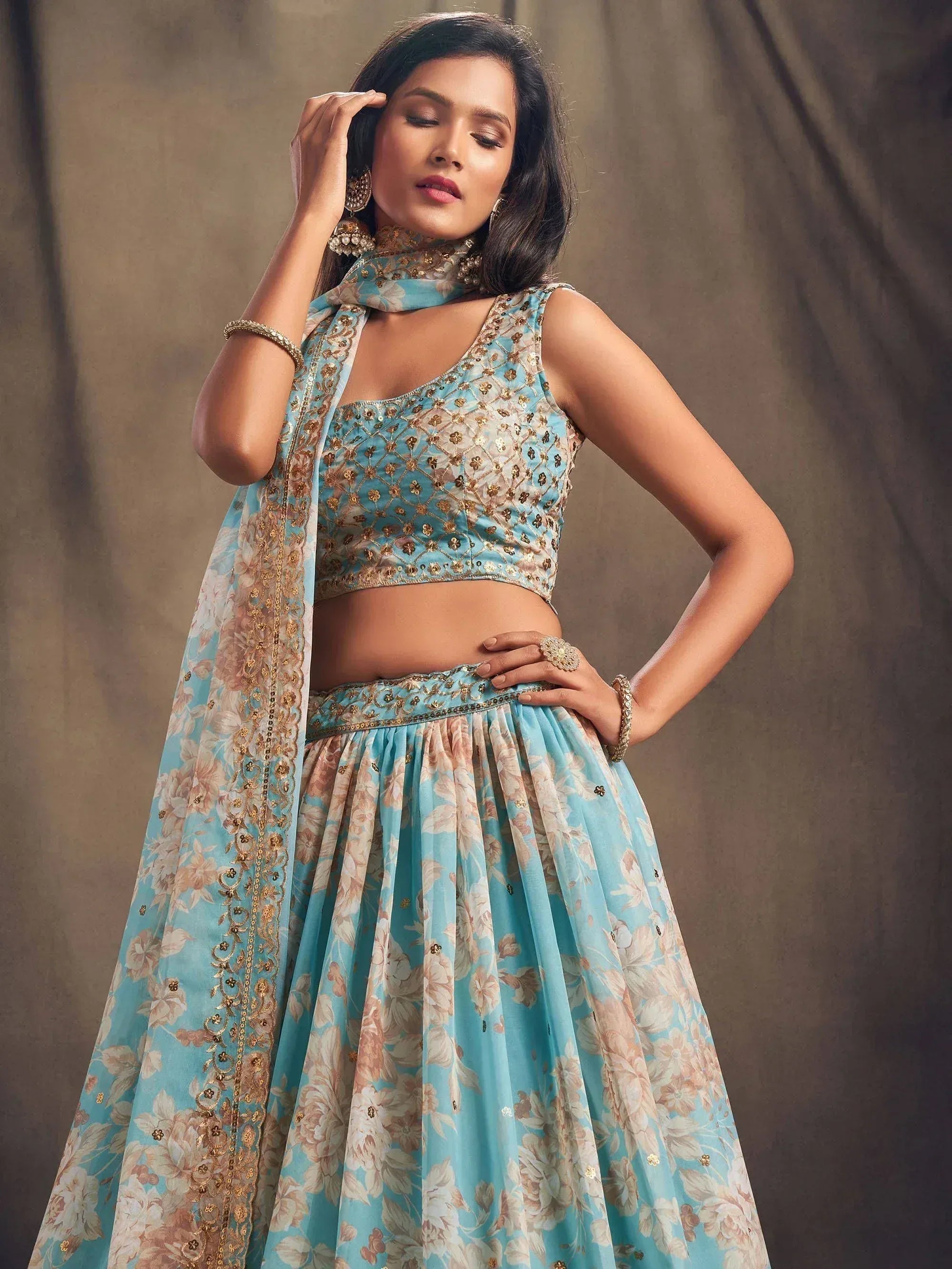 Blue floral lehenga choli with gold embroidery, perfect for Indian ethnic wear occasions
