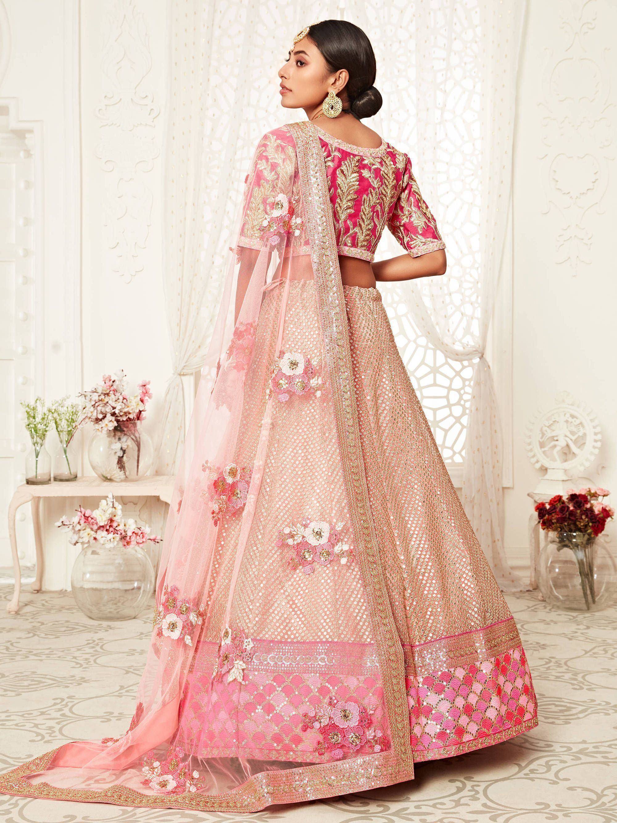 Pink and gold embroidered lehenga choli with floral appliques and sheer dupatta, perfect for Indian weddings
