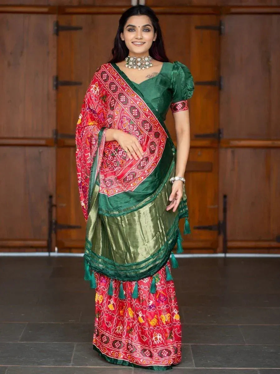 Green and red printed saree with puff sleeves, tassels, and ethnic embroidery for Indian wear
