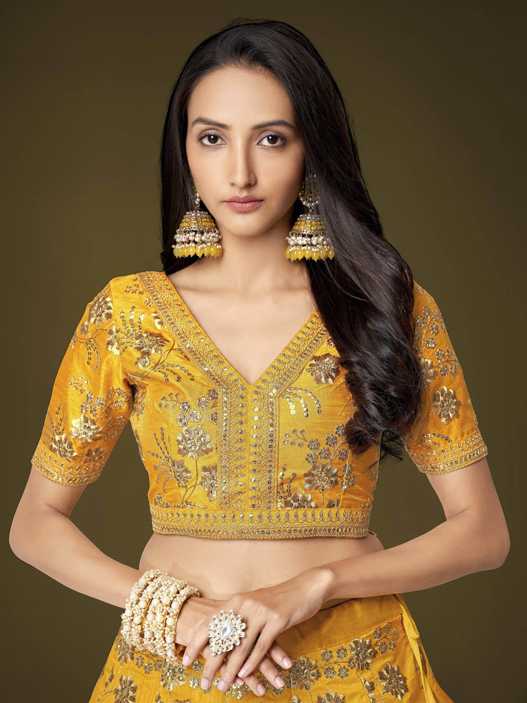 Fascinating Yellow Sequins Embroidery Slub Silk Lehenga Choli