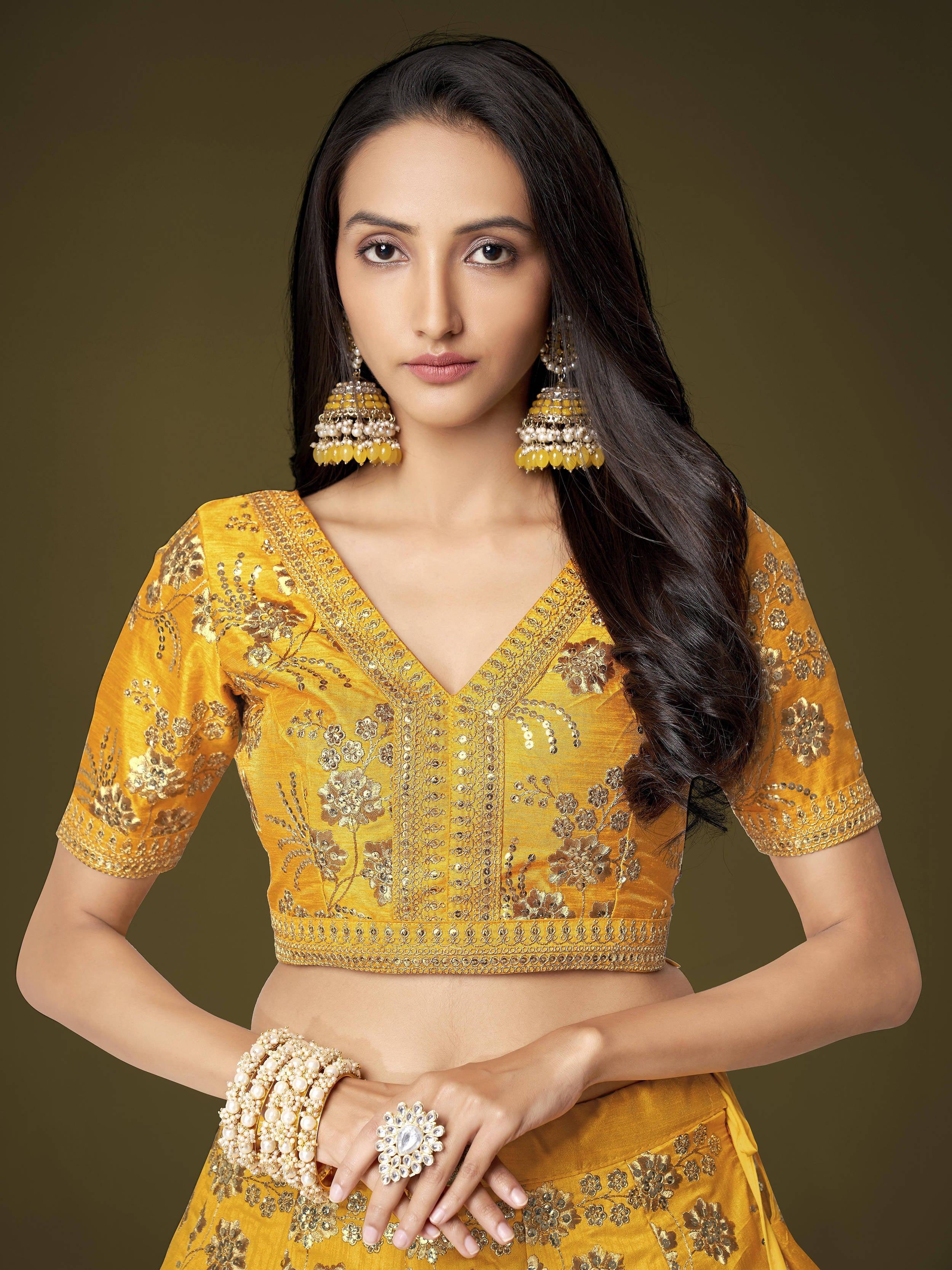 Fascinating Yellow Sequins Embroidery Slub Silk Lehenga Choli
