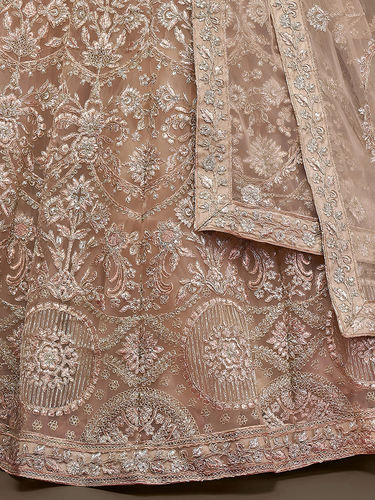 Ravishing Beige Embroidered Soft Net Ceremony Wear Lehenga Choli