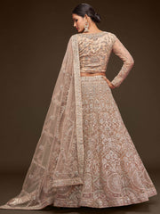 Ravishing Beige Embroidered Soft Net Ceremony Wear Lehenga Choli
