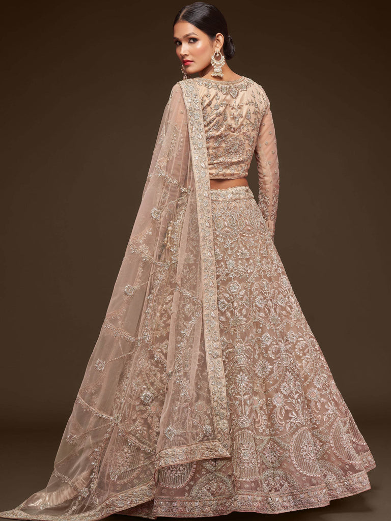 Ravishing Beige Embroidered Soft Net Ceremony Wear Lehenga Choli