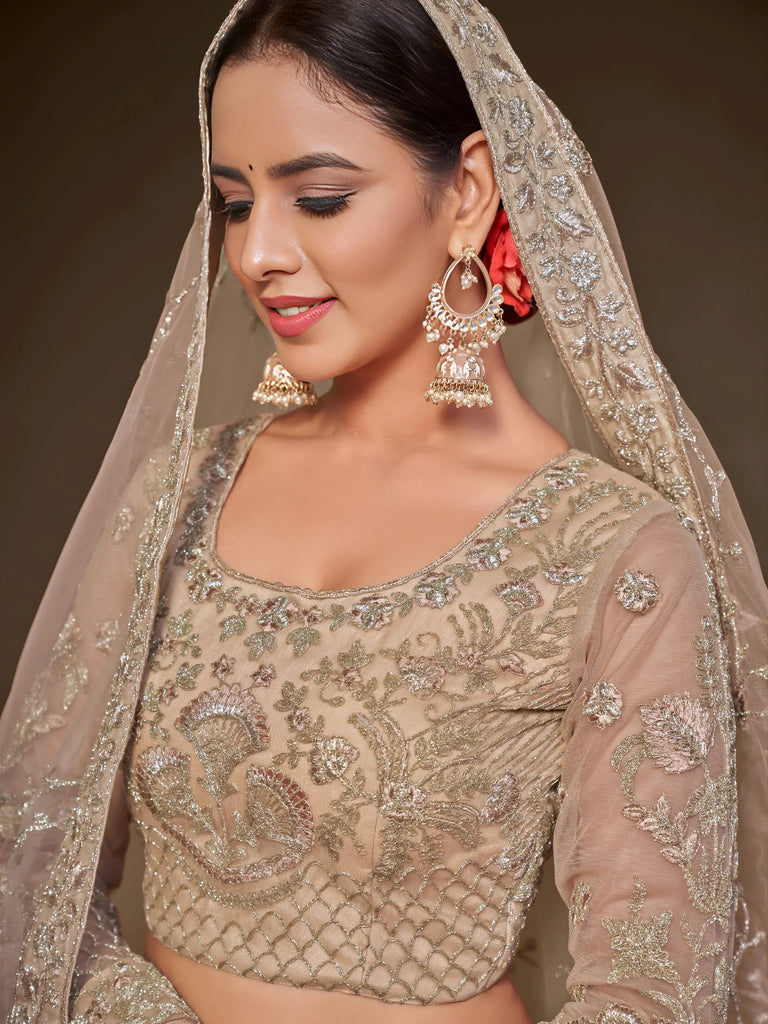 Gorgeous Beige Embroidered Soft Net Occasion Wear Lehenga Choli
