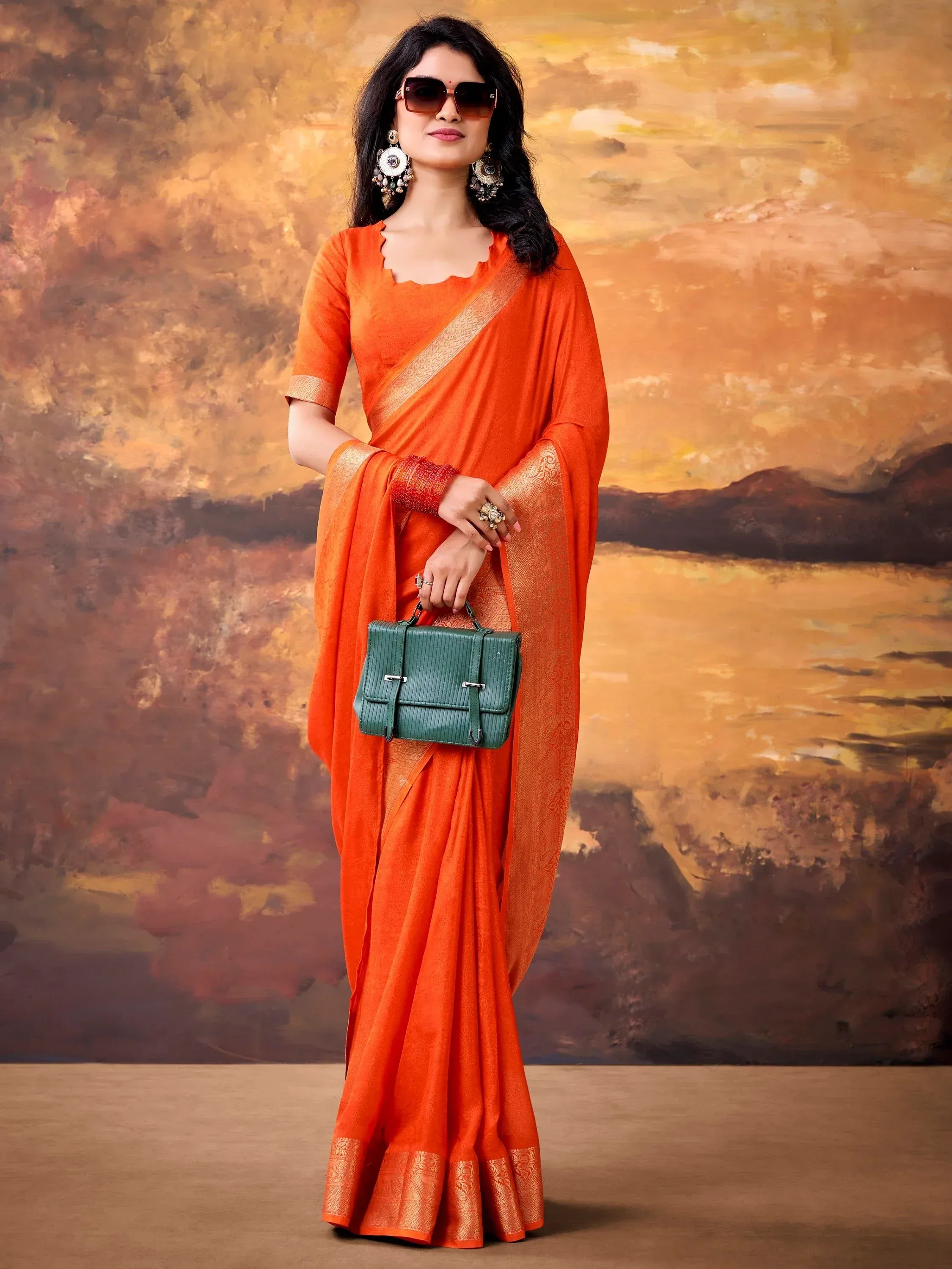 Elegant Orange Zari Weaving Georgette Festive Wear Saree With Blouse