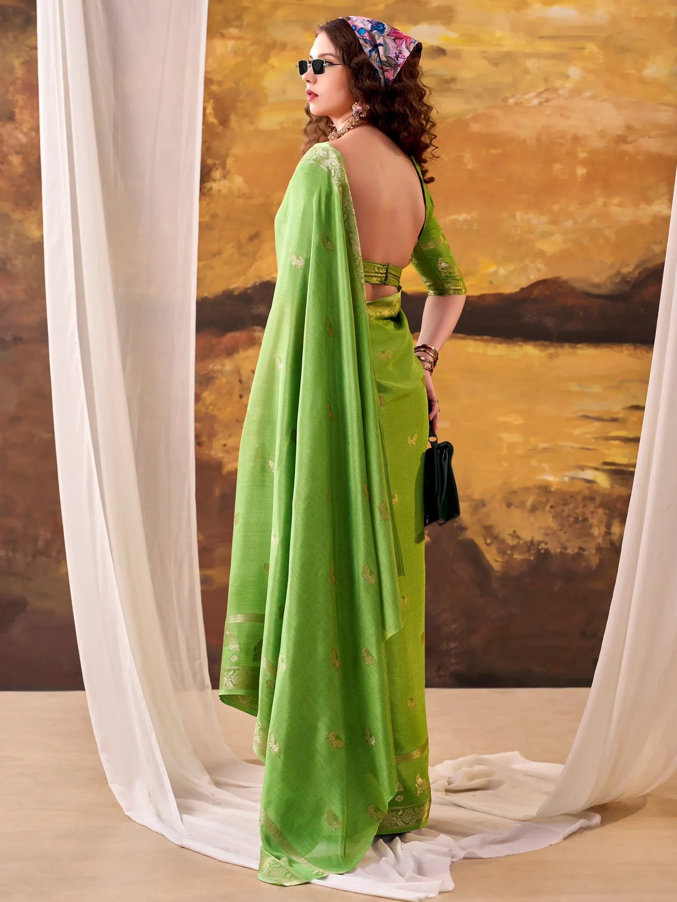 Exclusive Green Zari Weaving Crepe Event Wear Saree With Blouse