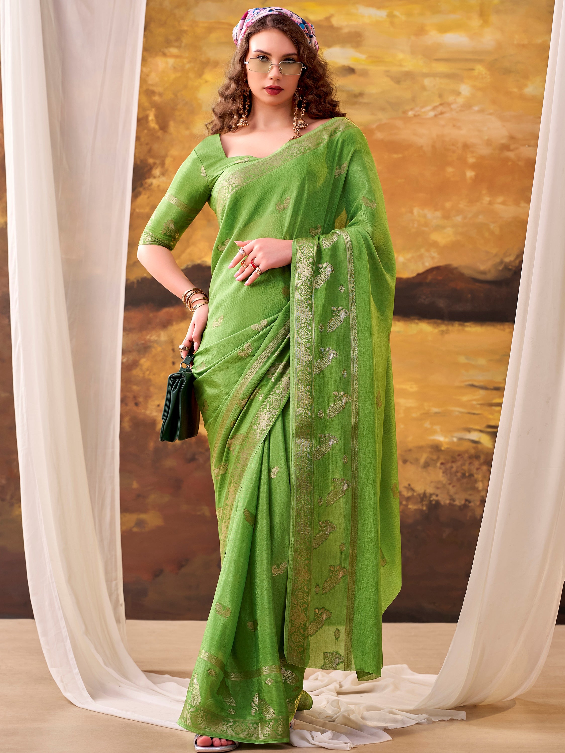 Exclusive Green Zari Weaving Crepe Event Wear Saree With Blouse