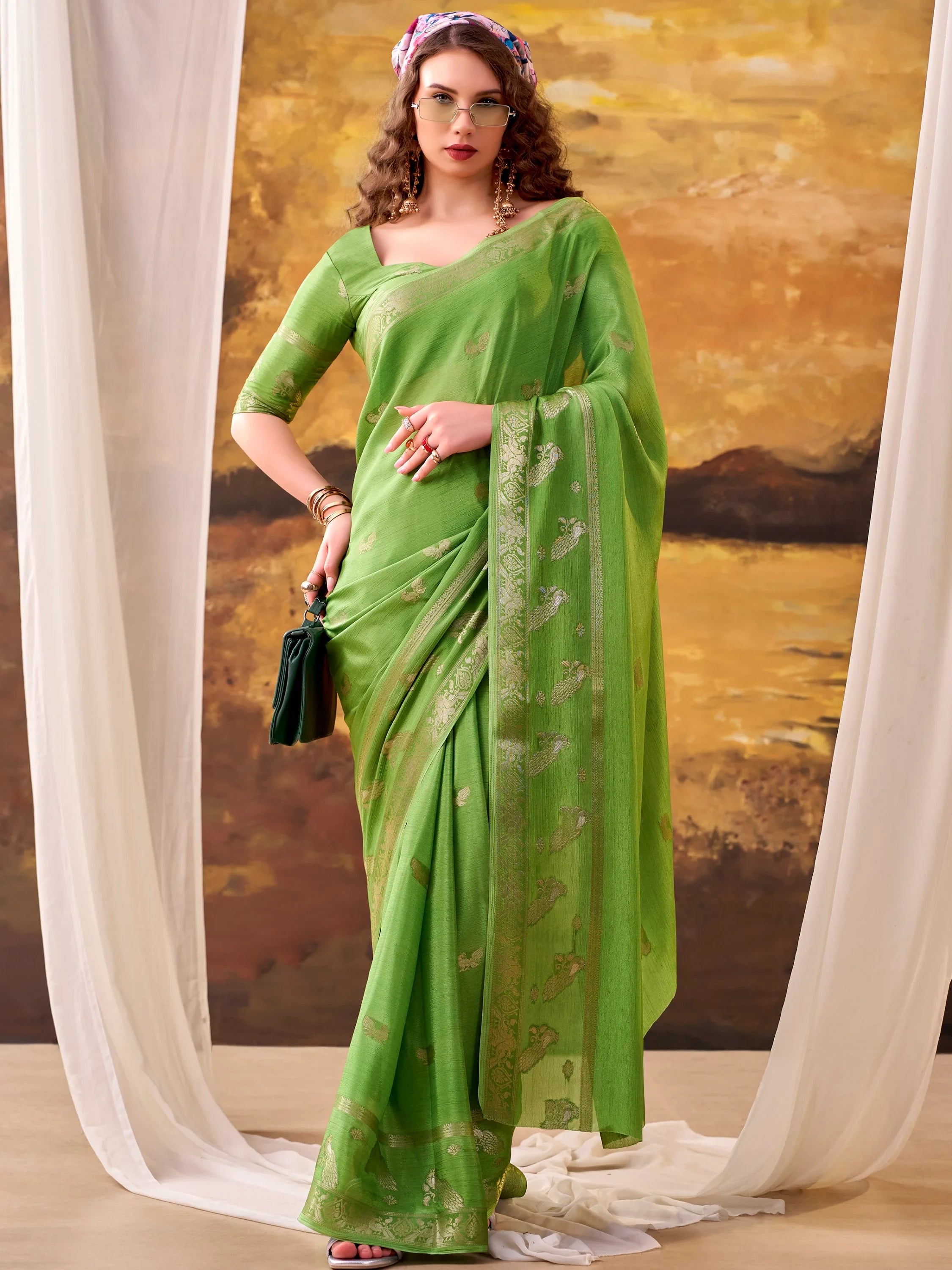 Exclusive Green Zari Weaving Crepe Event Wear Saree With Blouse