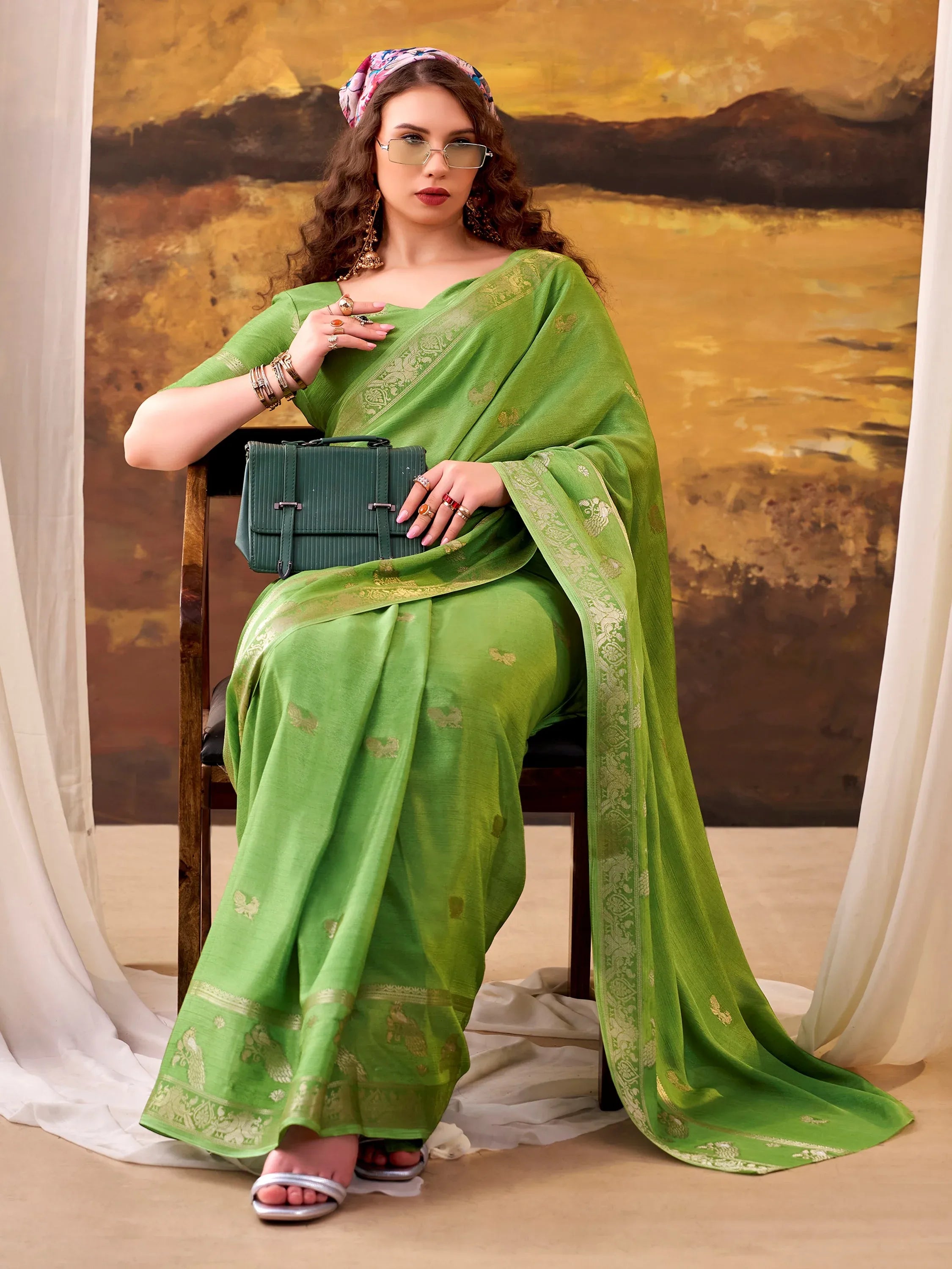 Exclusive Green Zari Weaving Crepe Event Wear Saree With Blouse