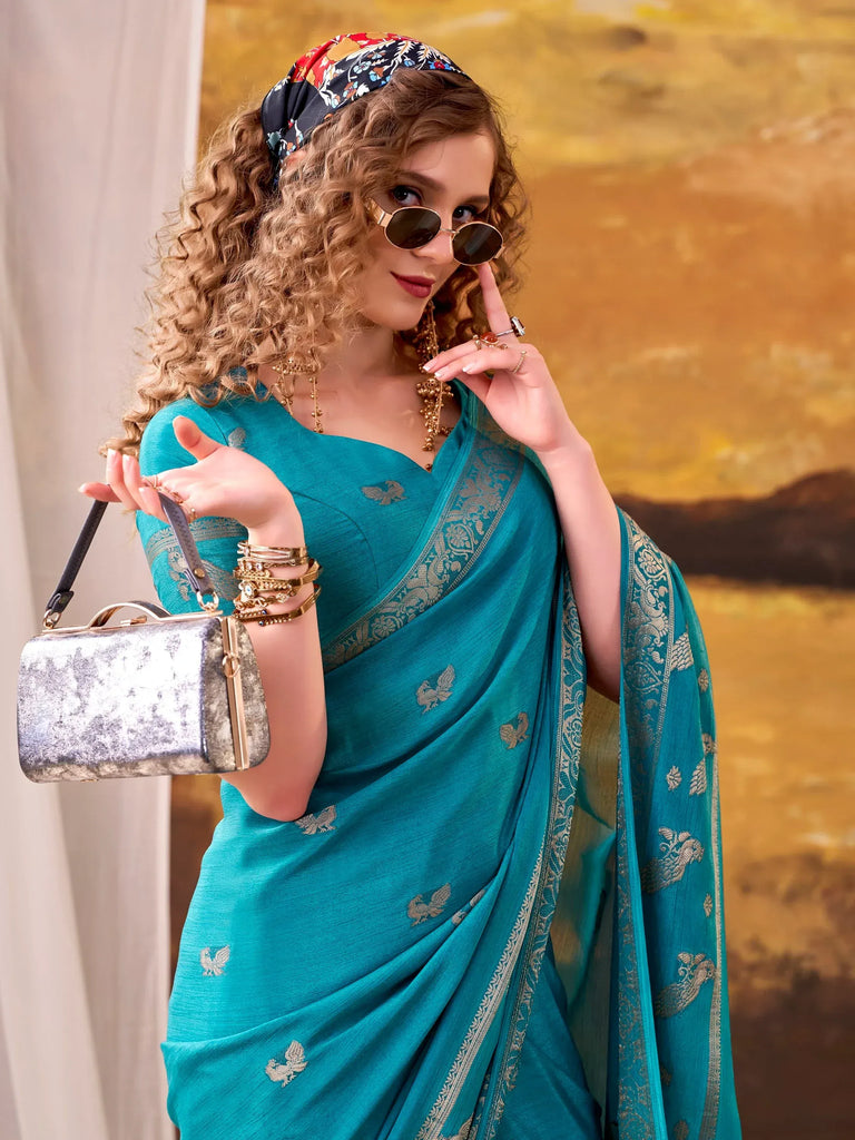 Ravishing Teal Blue Zari Weaving Crepe Casual Wear Saree With Blouse
