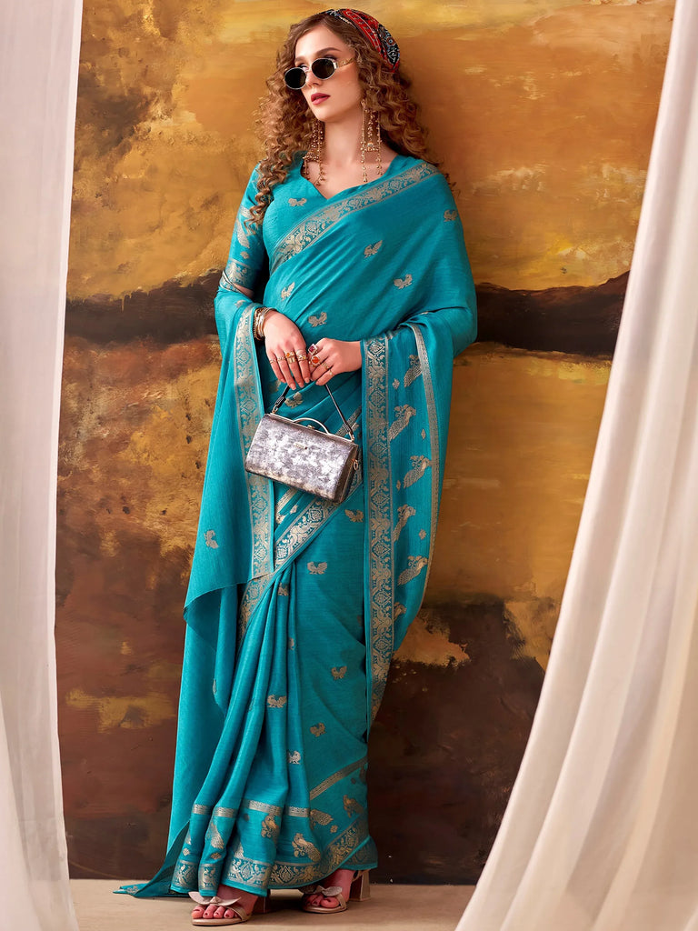 Ravishing Teal Blue Zari Weaving Crepe Casual Wear Saree With Blouse