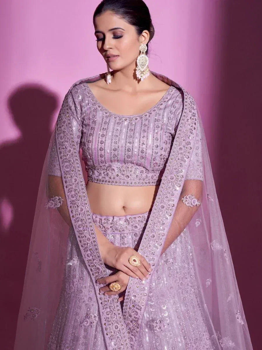 Lavender designer lehenga choli with intricate embroidery and sequin work, perfect for Indian ethnic occasions