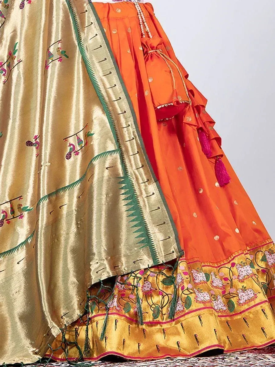 Orange and gold embroidered lehenga choli with bird motifs and tassels, Indian ethnic wear