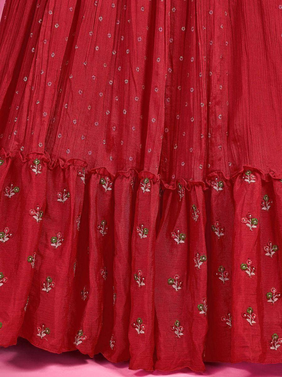 Red ethnic lehenga skirt with floral embroidery and ruffled hem, perfect for Indian weddings and festivals