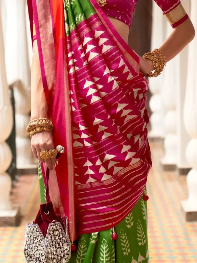 Gorgeous Green & Rani Printed Patola Silk Reception Wear Saree With Blouse