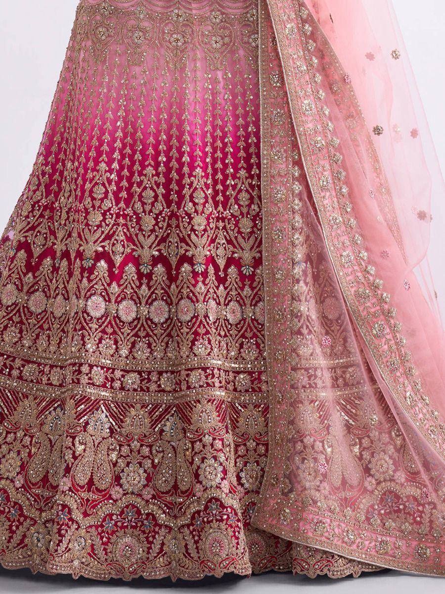 Pink and gold embroidered lehenga choli with detailed zari work and matching dupatta, ideal for Indian weddings