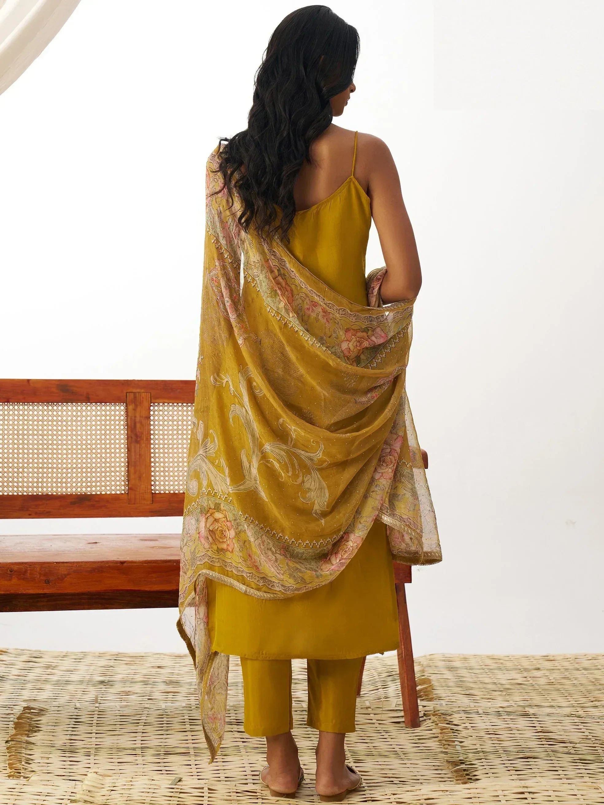 Yellow ethnic salwar kameez with floral dupatta, perfect for Indian wear