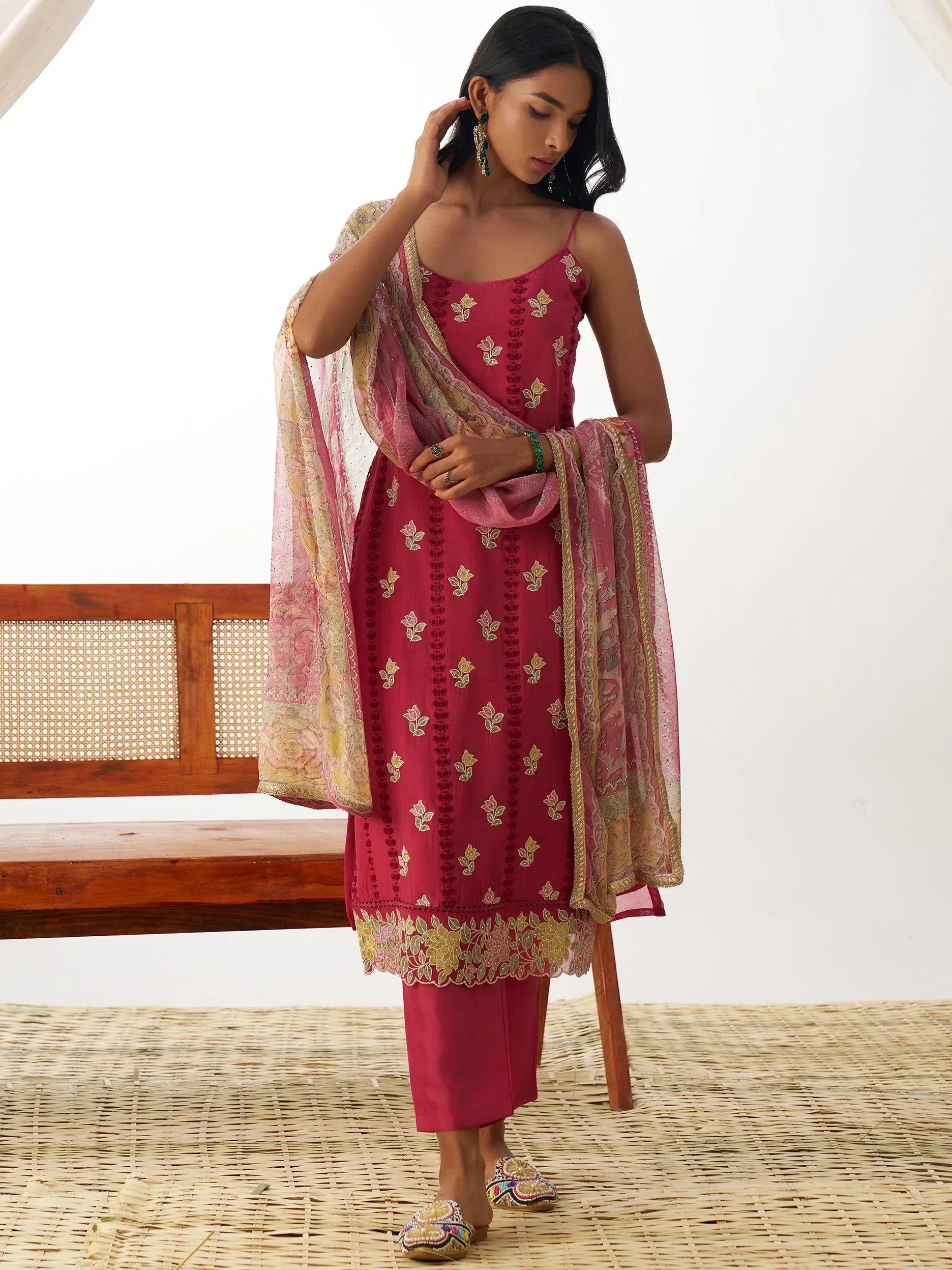 Elegant maroon embroidered salwar kameez with floral dupatta, perfect for Indian ethnic wear occasions.