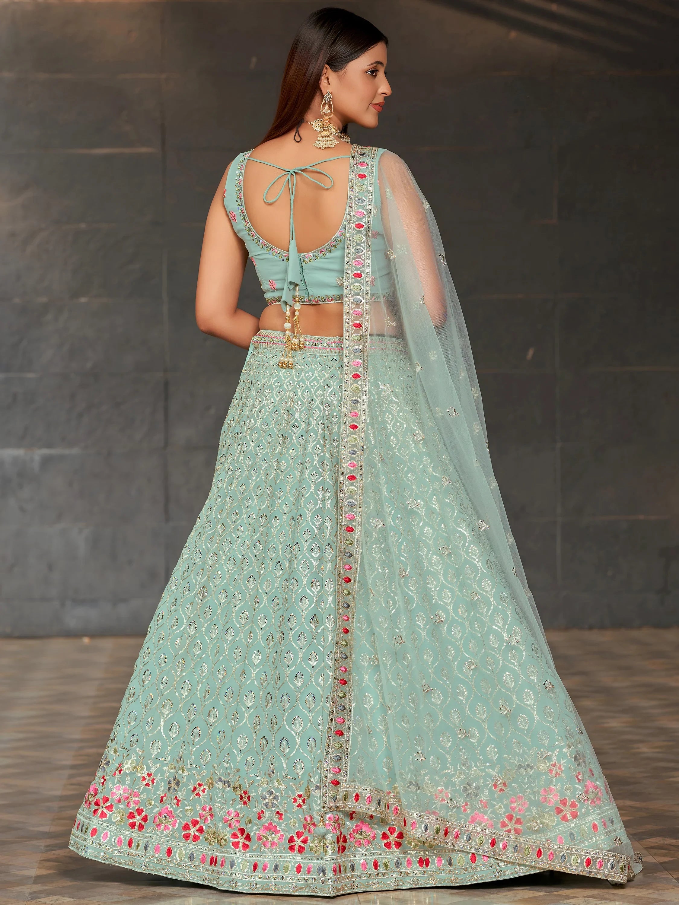 Awesome Sky-Blue Sequins Georgette Engagement Wear Lehenga Choli