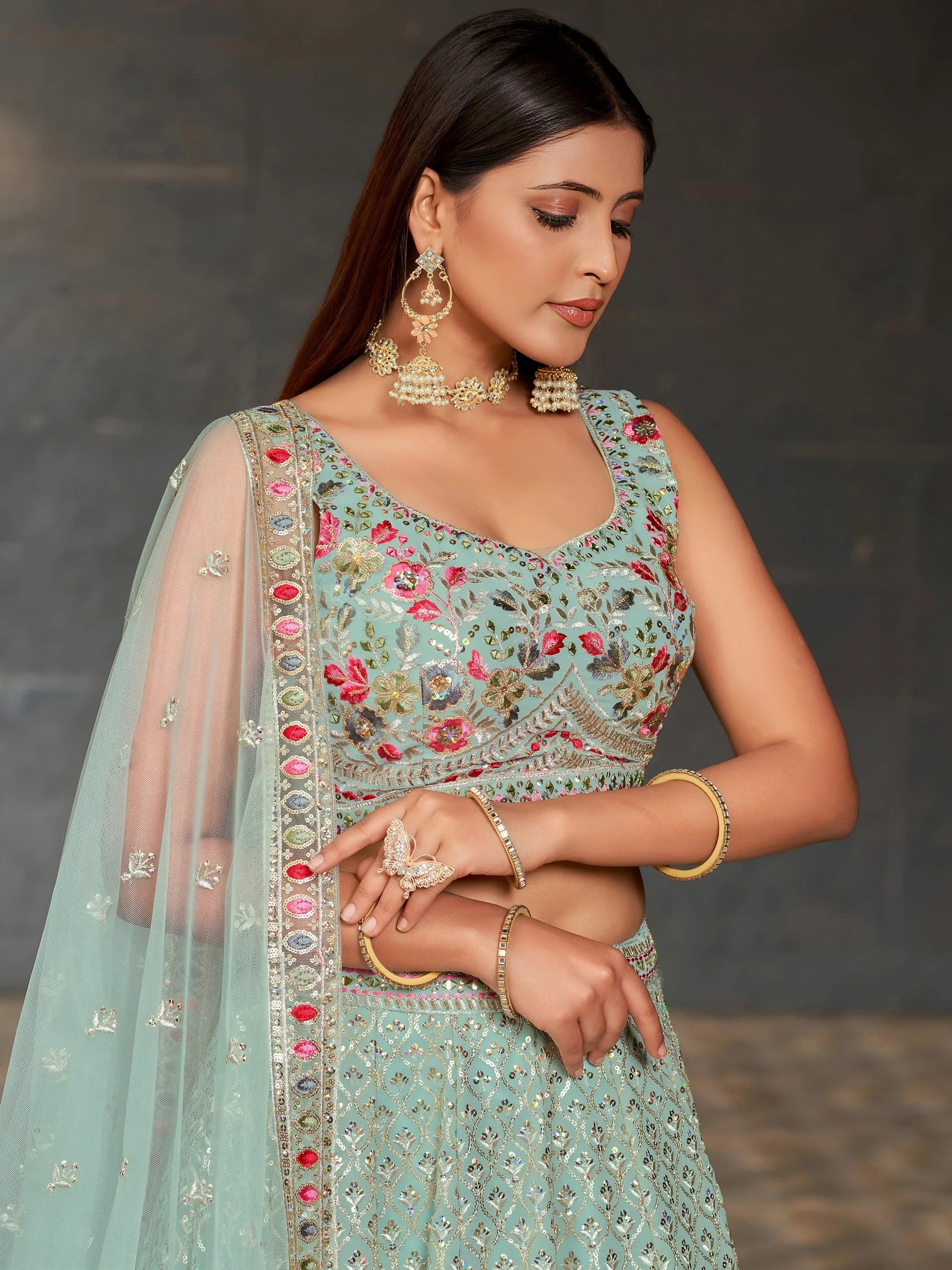 Awesome Sky-Blue Sequins Georgette Engagement Wear Lehenga Choli