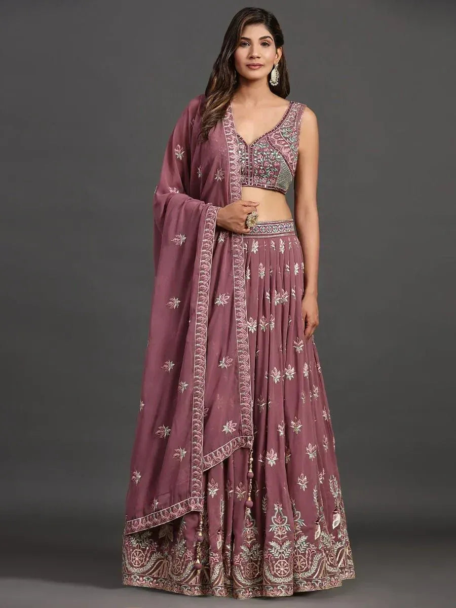 Mauve embroidered lehenga choli with floral motifs and matching dupatta, ideal for Indian ethnic occasions
