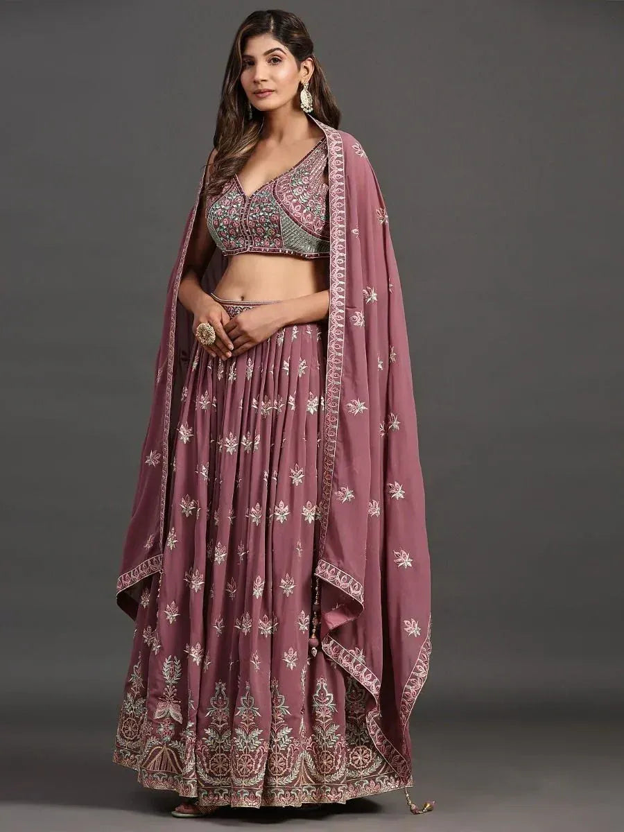 Mauve embroidered lehenga choli with floral motifs and matching dupatta, ideal for Indian ethnic occasions