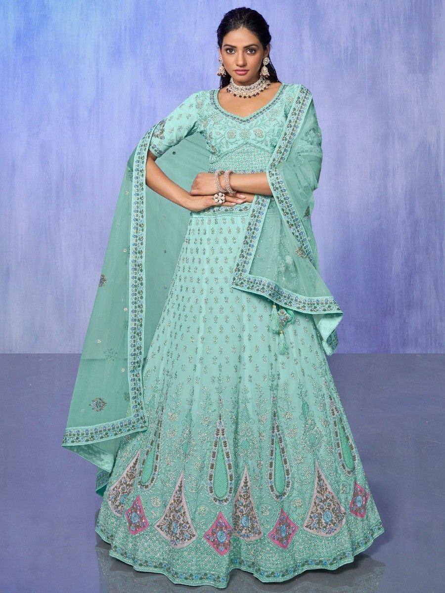 Mint green designer lehenga choli with intricate embroidery and matching dupatta for Indian ethnic wear
