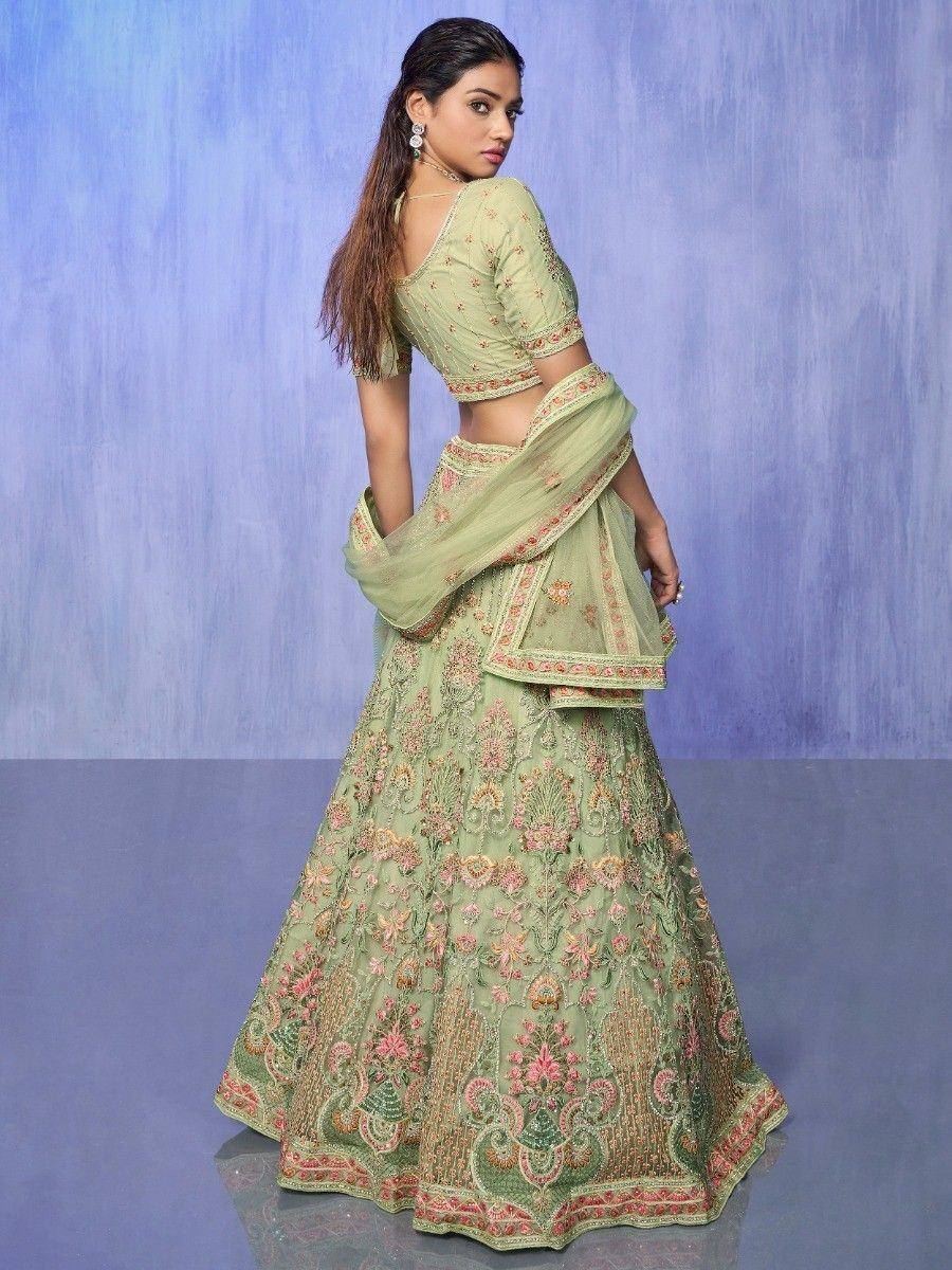 Mint green embroidered lehenga choli with floral motifs, perfect for Indian ethnic wear occasions