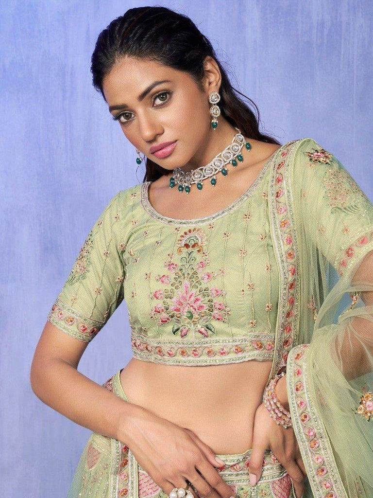 Wonderful Green Embroidered Net Wedding Lehenga Choli With Dupatta