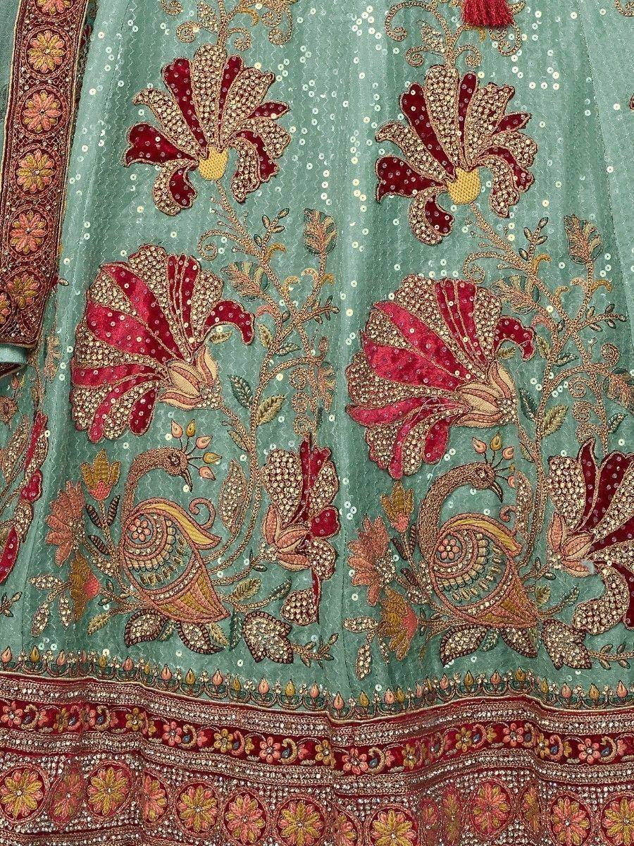 Mint green lehenga with red floral and peacock embroidery, perfect for Indian ethnic wear