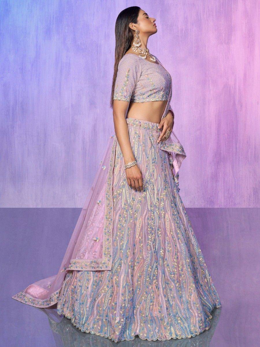 Elegant pastel lehenga choli with intricate embroidery, perfect for Indian ethnic wear occasions